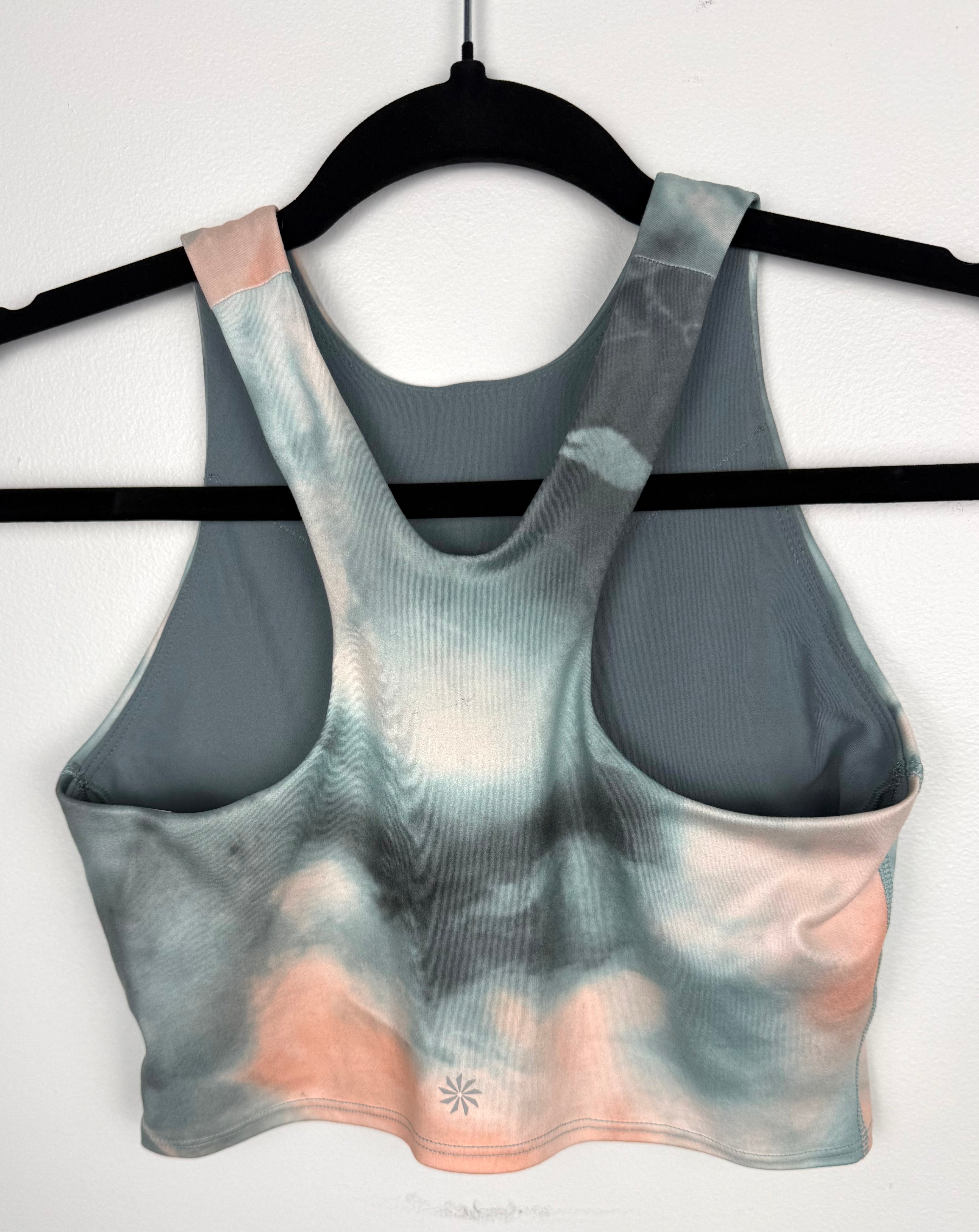 back of Athleta tie dye  Sports Bra Crop Top on hanger