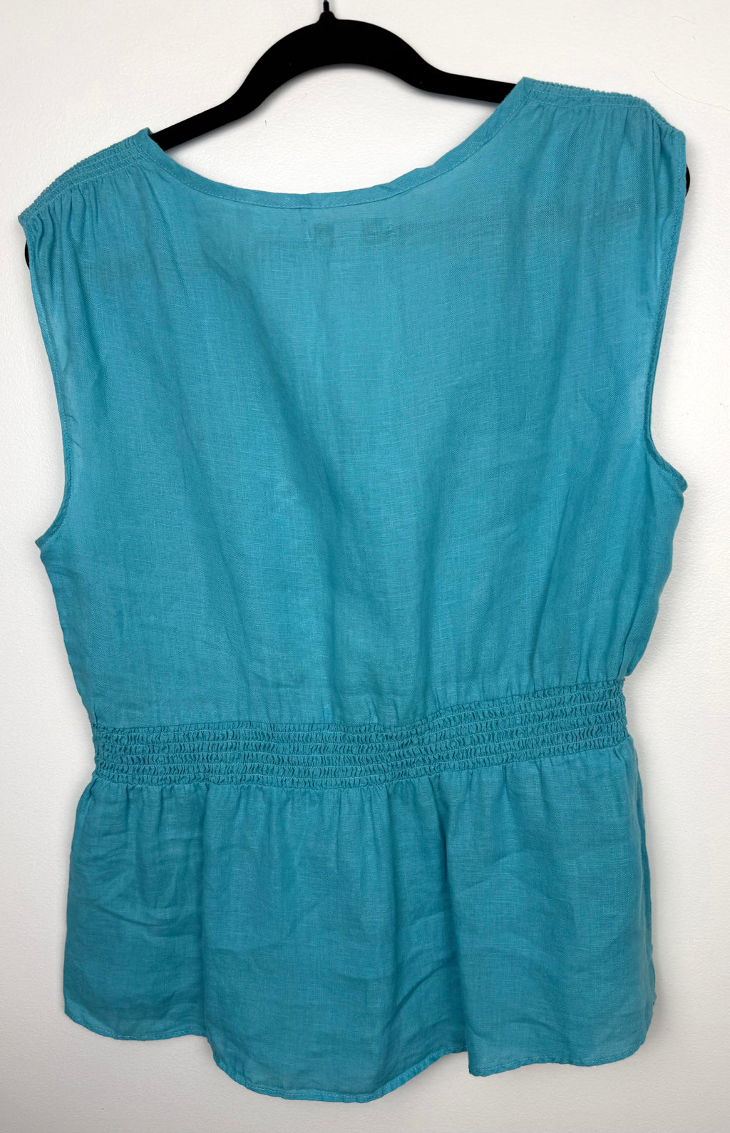 back of Banana Republic 100% Linen Smocked Waist V-Neck Blouse Aqua Coloured | Size L at Blue Sparrow Shop Canadian Resale Reimagined  on hanger