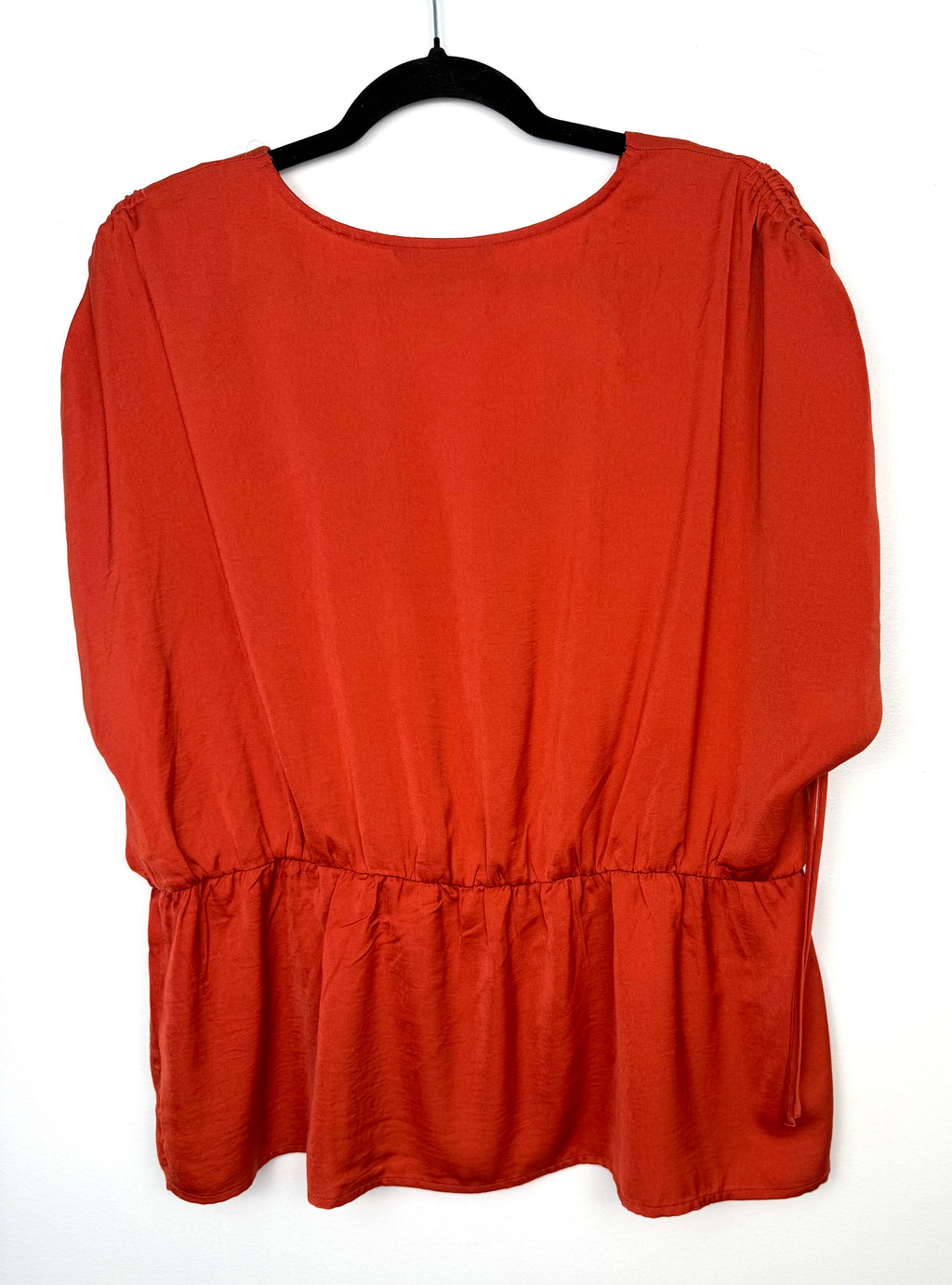 back of Banana Republic ruched sleeve peplum top in rust 