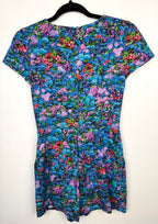 back of Birds of North America floral romper with impressionist hydrangea print on hanger