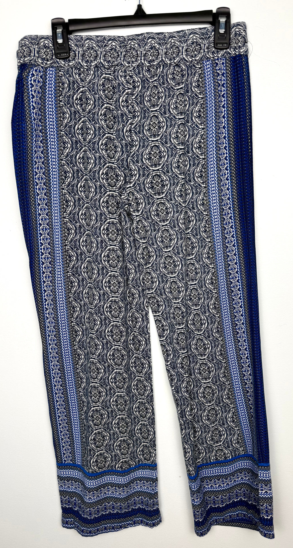 back of Boho Medallion Print Wide-Leg Palazzo Pants | Size M at Blue Sparrow Shop on hanger