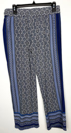 back of Boho Medallion Print Wide-Leg Palazzo Pants | Size M at Blue Sparrow Shop on hanger