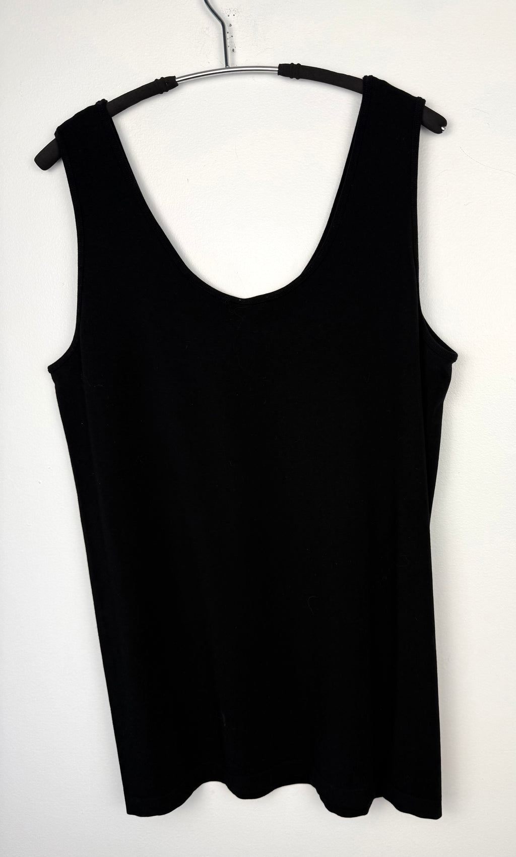 back of C'est Moi Bamboo Smoothing Tank Top | One Size Plus | Black Bamboo Plus Sized Tank Top at Blue Sparrow Shop on hanger