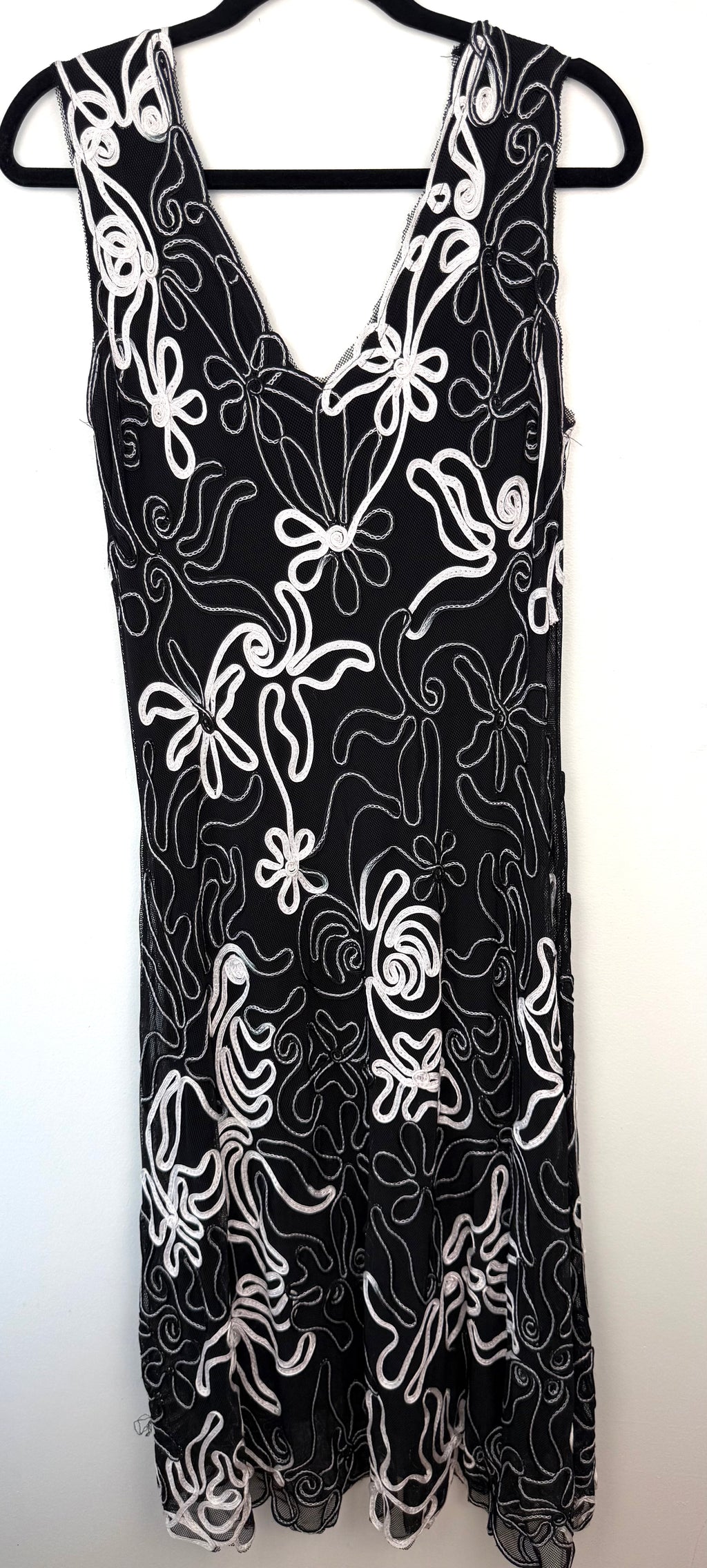 back of Cartise Embroidered Mesh Cocktail Dress | Size 12 at Blue Sparrow Shop on hanger