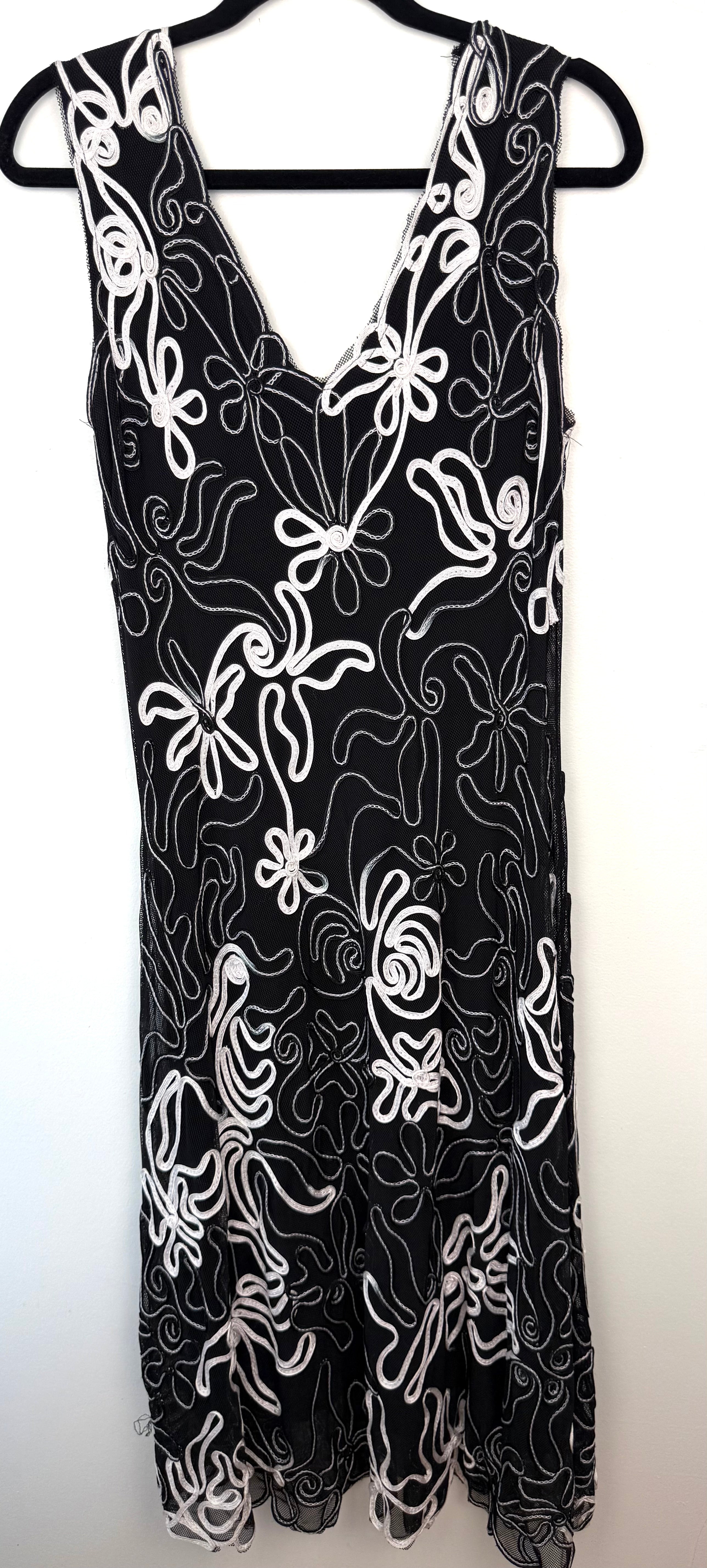 back of Cartise Embroidered Mesh Cocktail Dress | Size 12 at Blue Sparrow Shop on hanger