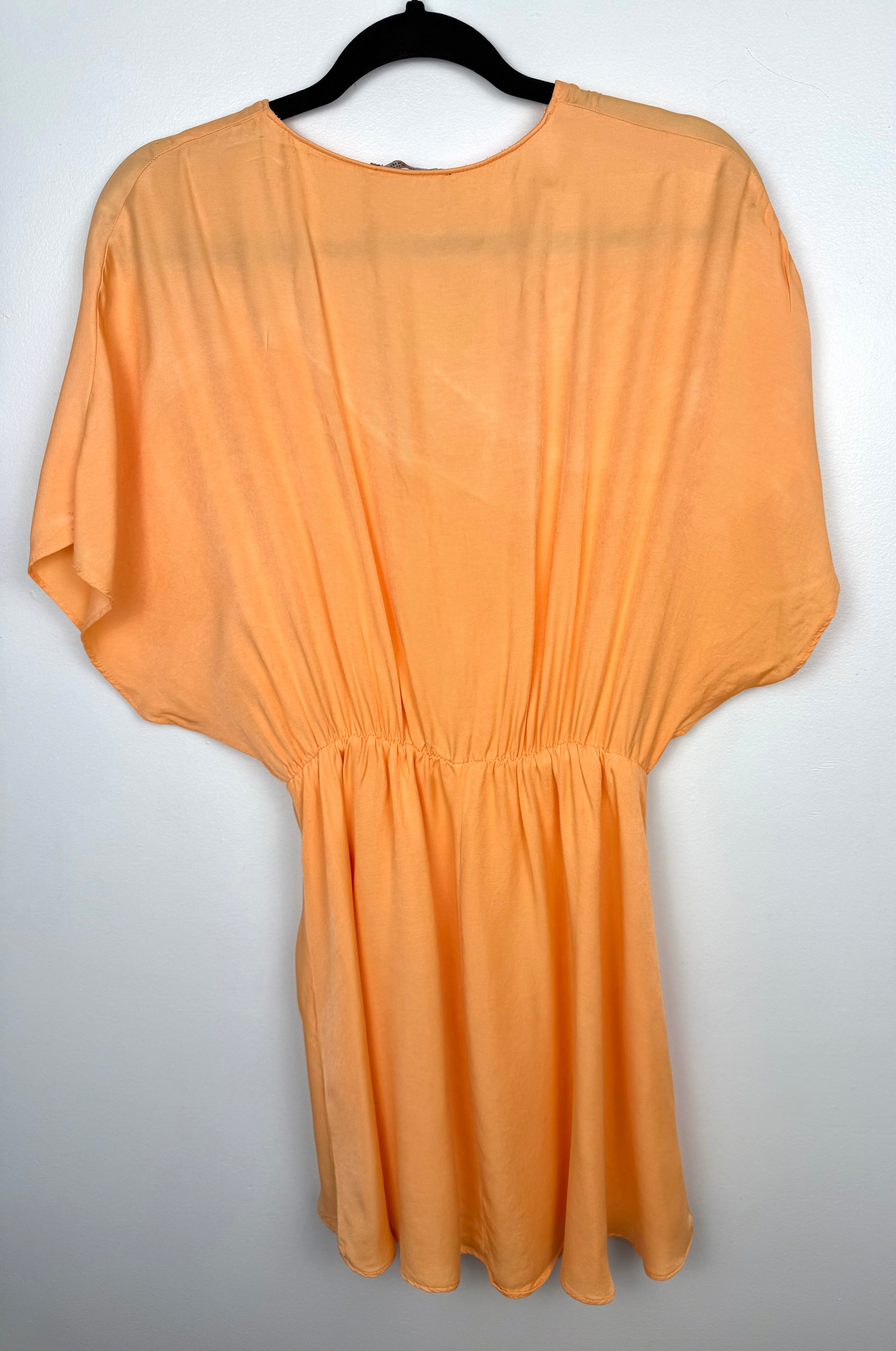 back of Deep V Neck Zara peach dress with batwing sleeve fully lined  on hanger