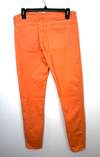 back of GAP 1969 orange skinny jeans women size 28 mid rise stretch denim on hanger