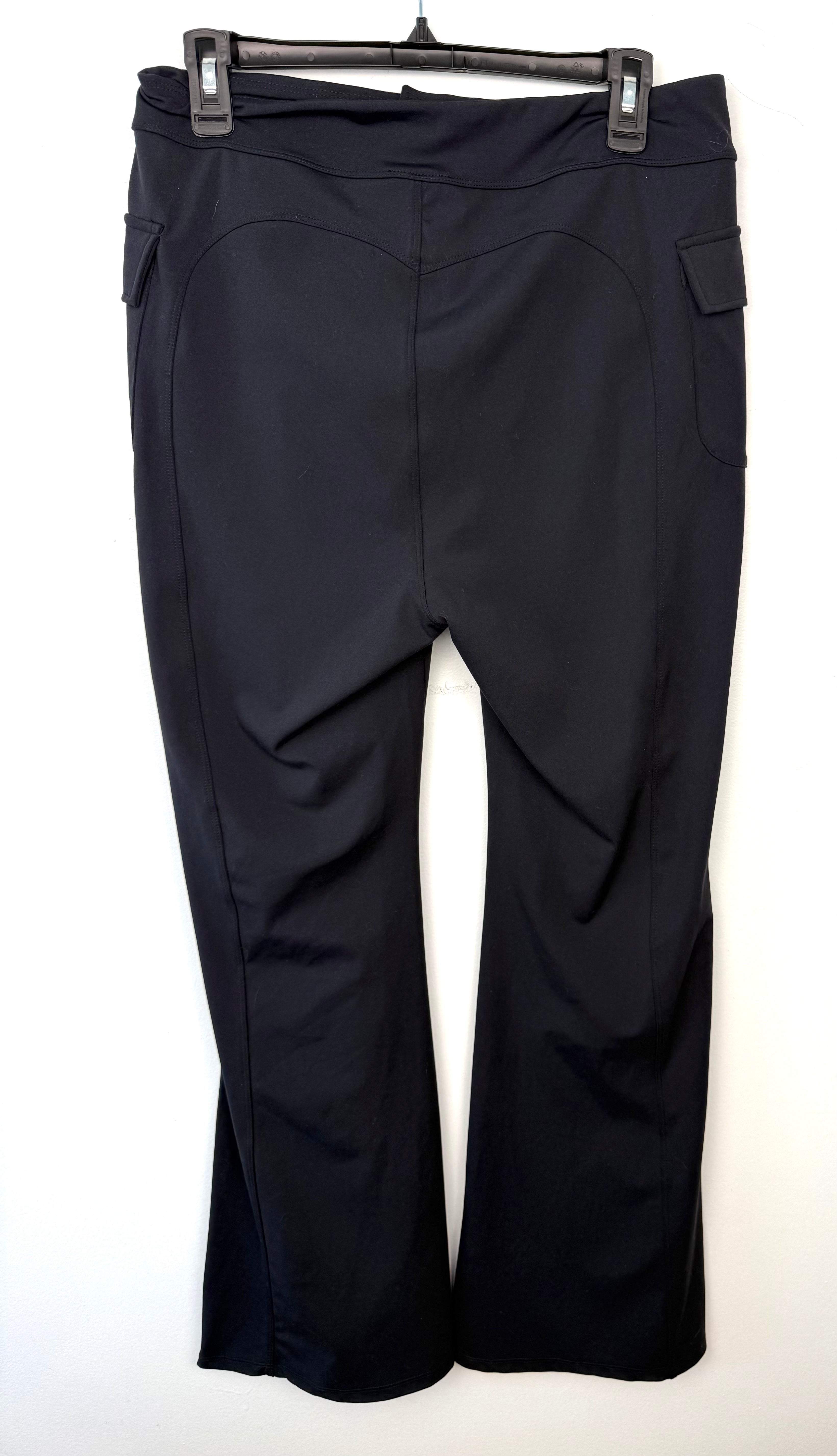 back of Halara Flared Petite Black Stretch Pants | Size L at Blue Sparrow Shop on hanger