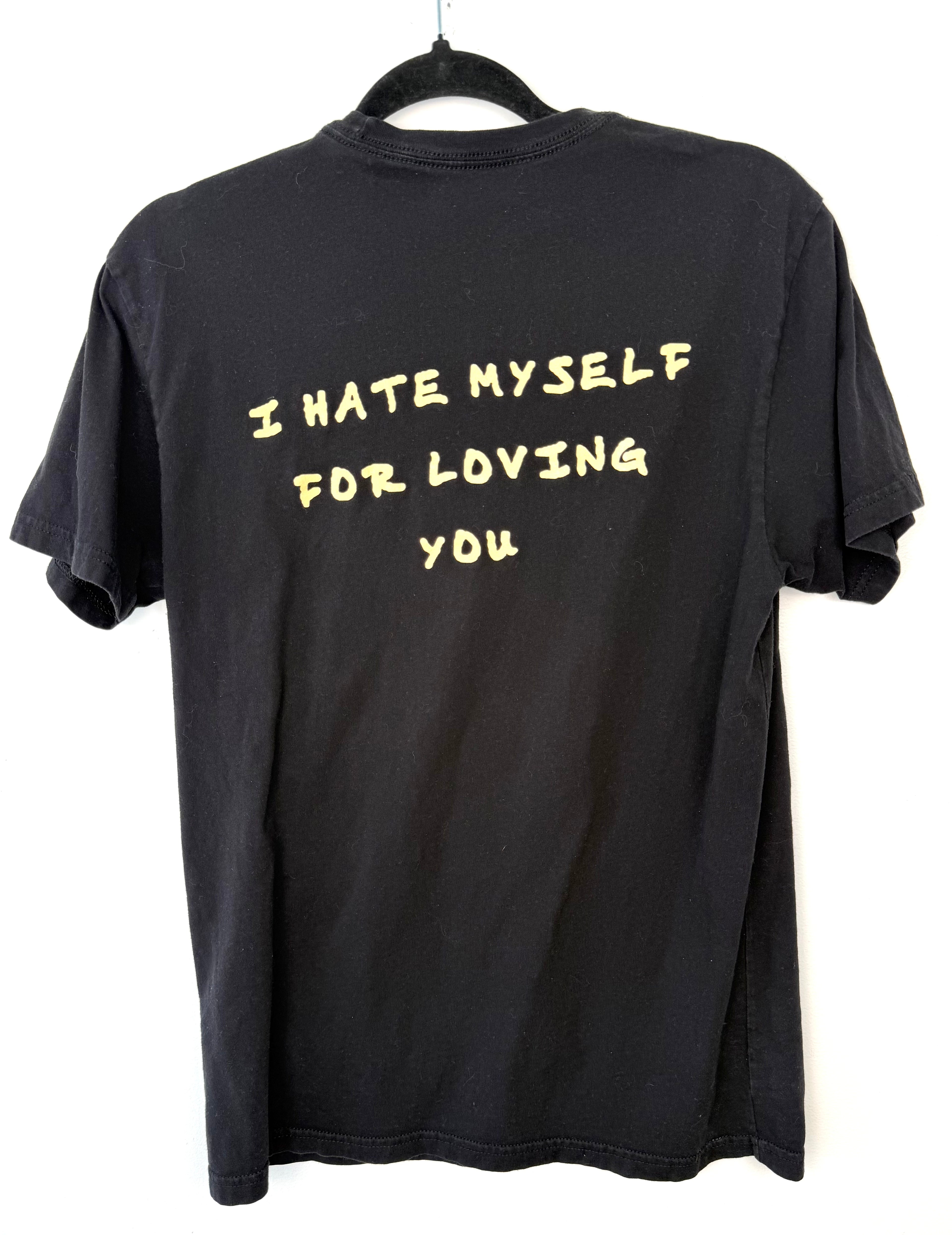 back of Joan Jett and the Blackhearts 100% Cotton Band Tee — Official Merch | Size M at Blue Sparrow Shop on hanger - I hate myself for loving you graphic 