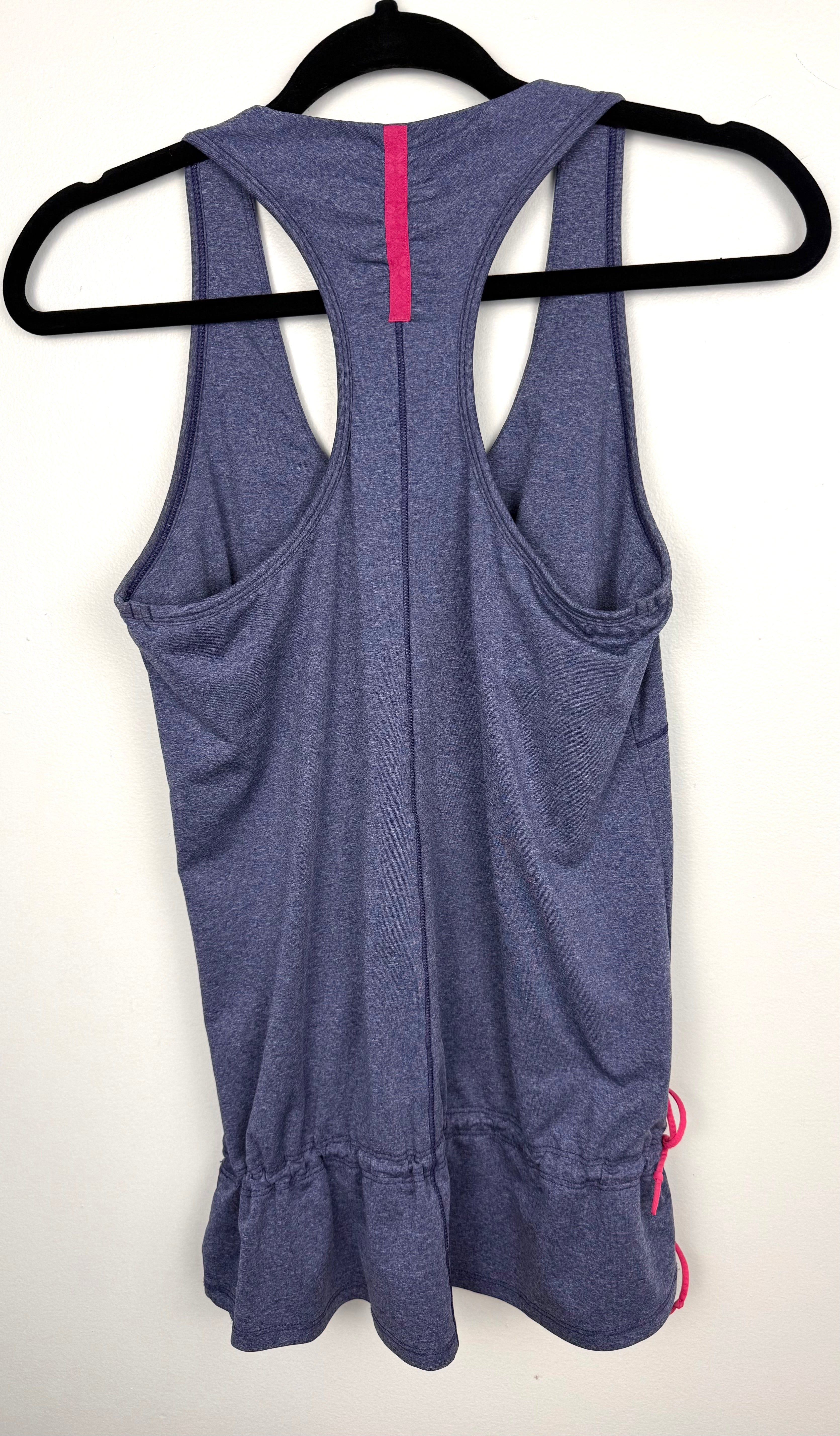 back of back of MEC Mountain Equipment Company athletic racerback tank  on hanger