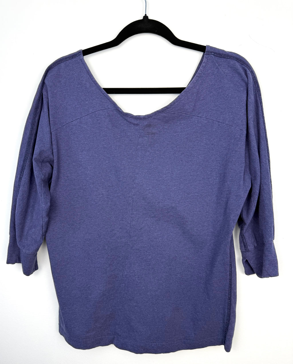 back of MEC Organic Cotton Long Sleeve Top in blue  on hanger