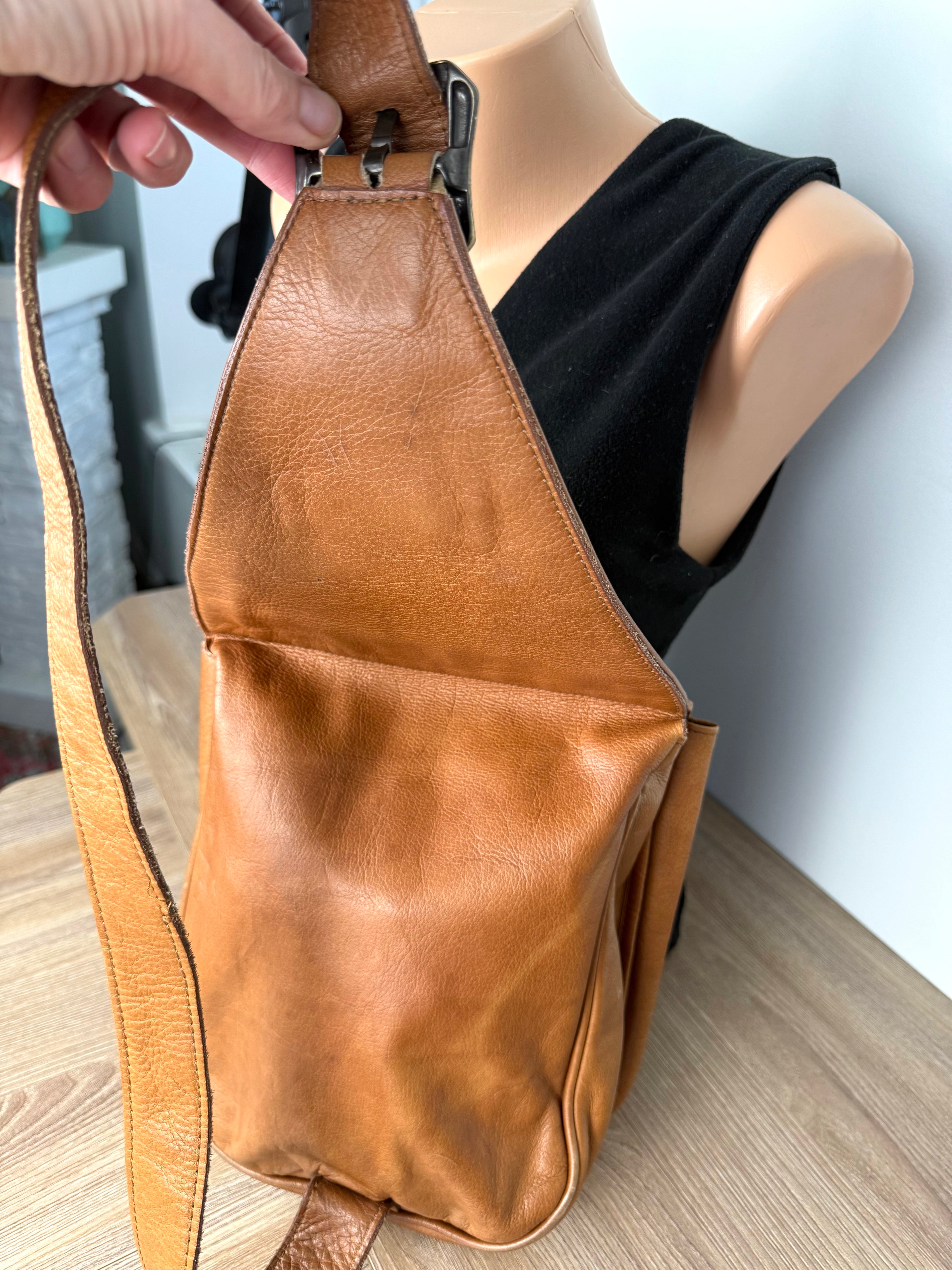 back of Mesace 1910 Cognac Leather Western Saddle Sling Bag