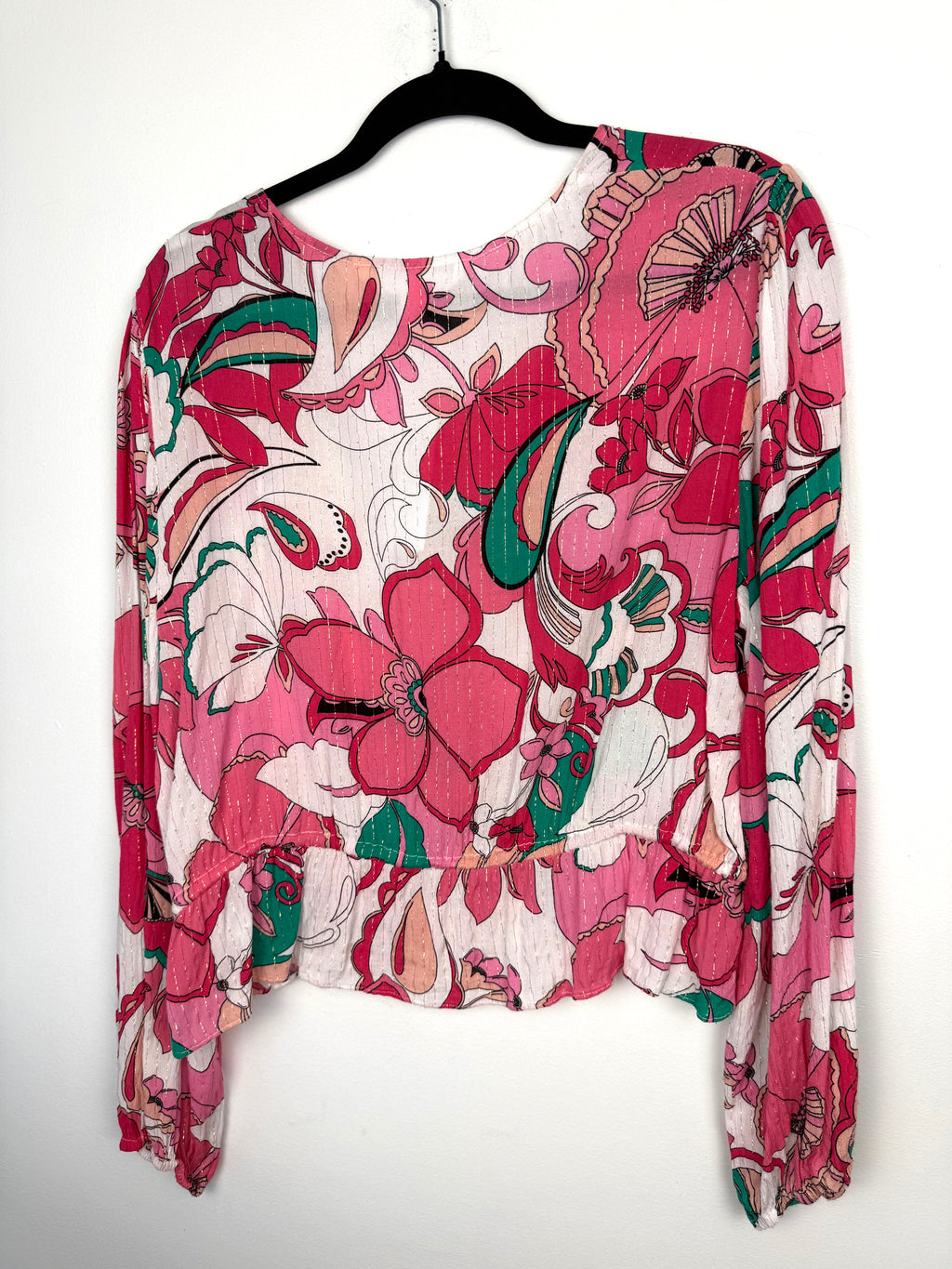 back of NWT Joe Fresh x Oscar Gariepy Floral Peplum Blouse at Blue Sparrow Shop on hanger