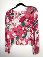back of NWT Joe Fresh x Oscar Gariepy Floral Peplum Blouse at Blue Sparrow Shop on hanger