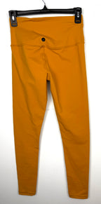 back of NWT PrAna Chakara 7/8 Leggings Deep Solstice  on hanger