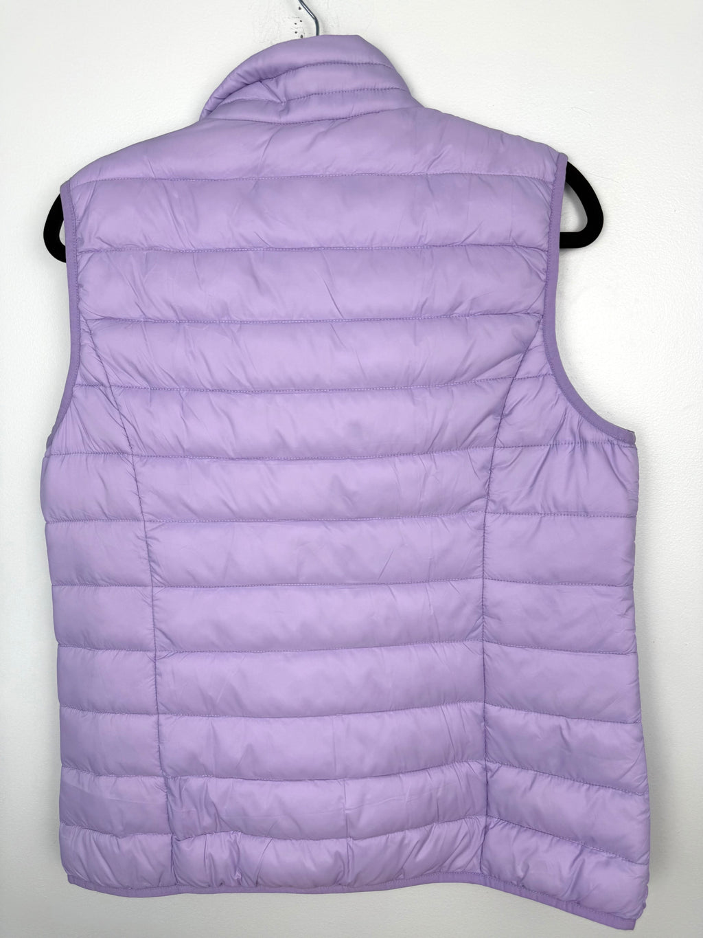 back of  NWT Quilted Puffer Vest | Size L  at Blue Sparrow Shop on hanger