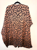 back of Oversized Fleece Poncho | One Size on hanger