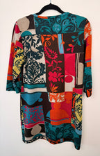 back of Papillion Tunic Sweater Dress | Size M on hanger