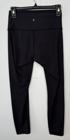 back of Pre-loved Lululemon Black High Waisted Leggings | Size 6 at Blue Sparrow Shop on hanger