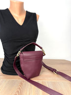 back of Riona Mini Crossbody Bag  at Blue Sparrow Shop on mannequin to show size