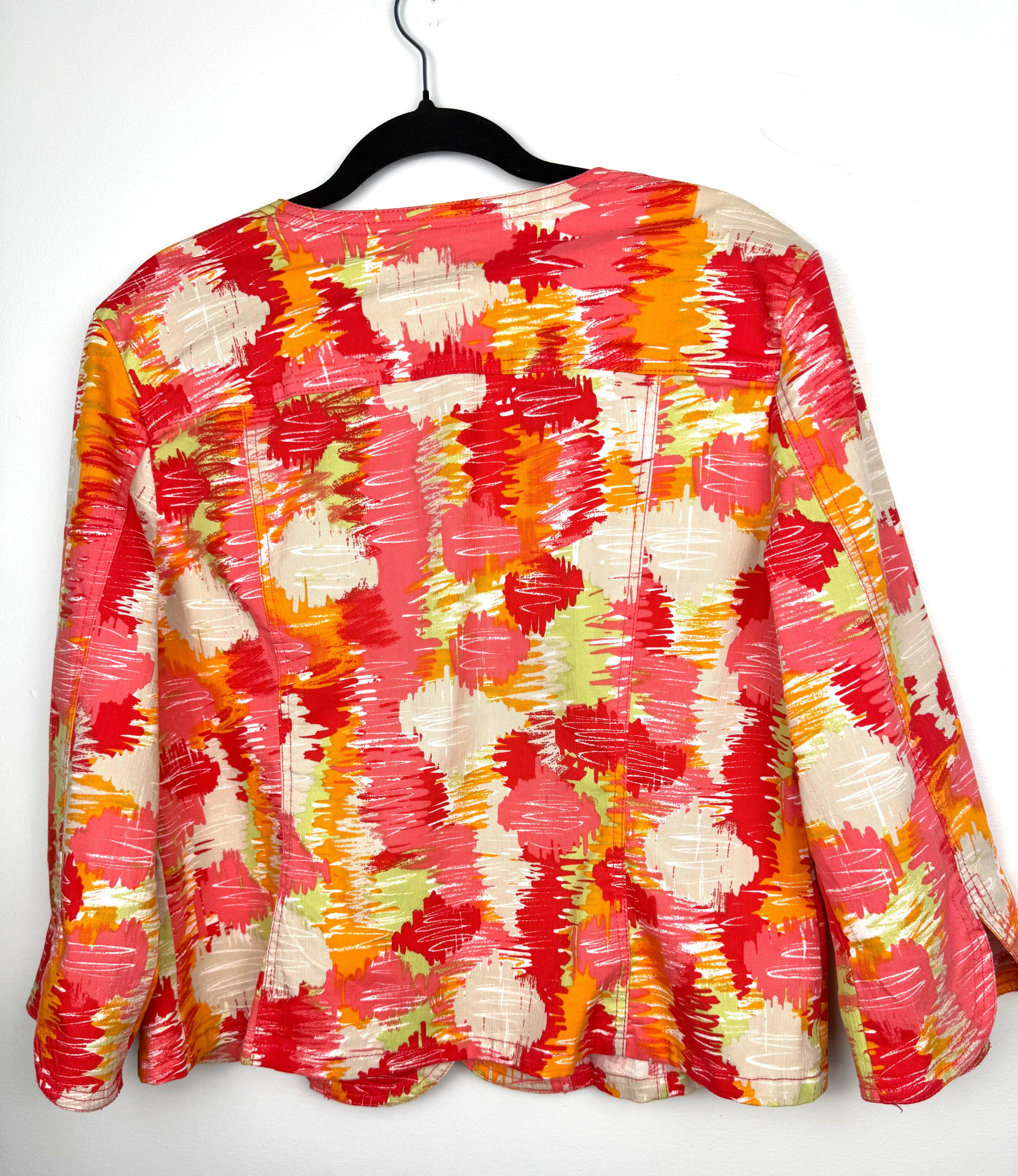 back of Ruby Red Multi Coloured denim style jacket  on hanger
