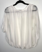 back of Tendenze made in italy star print overlay top on hanger