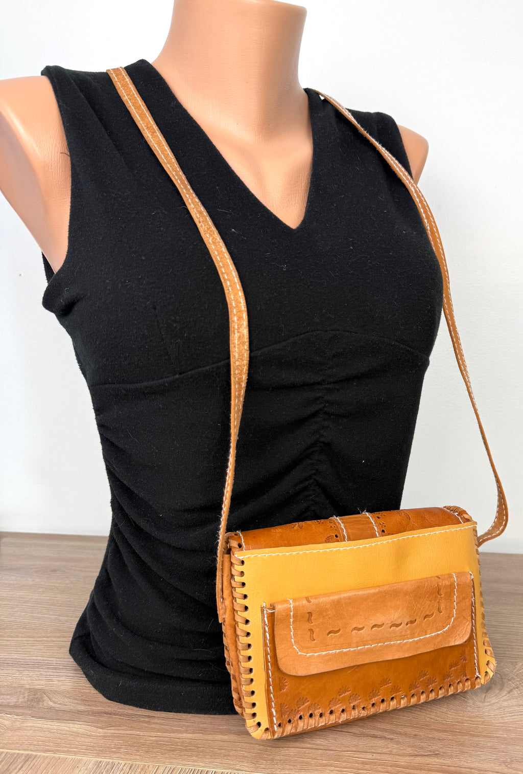 back of Vintage Hand-Tooled Leather Crossbody Bag at Blue Sparrow Shop on mannequin to show size