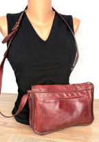 back of Vintage Rowland Leather Crossbody Bag circa 1970/1980  on mannequin for scale