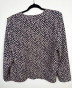 back of Vintage floral print navy Jacket Made in Canada at Blue Sparrow Shop  on hanger