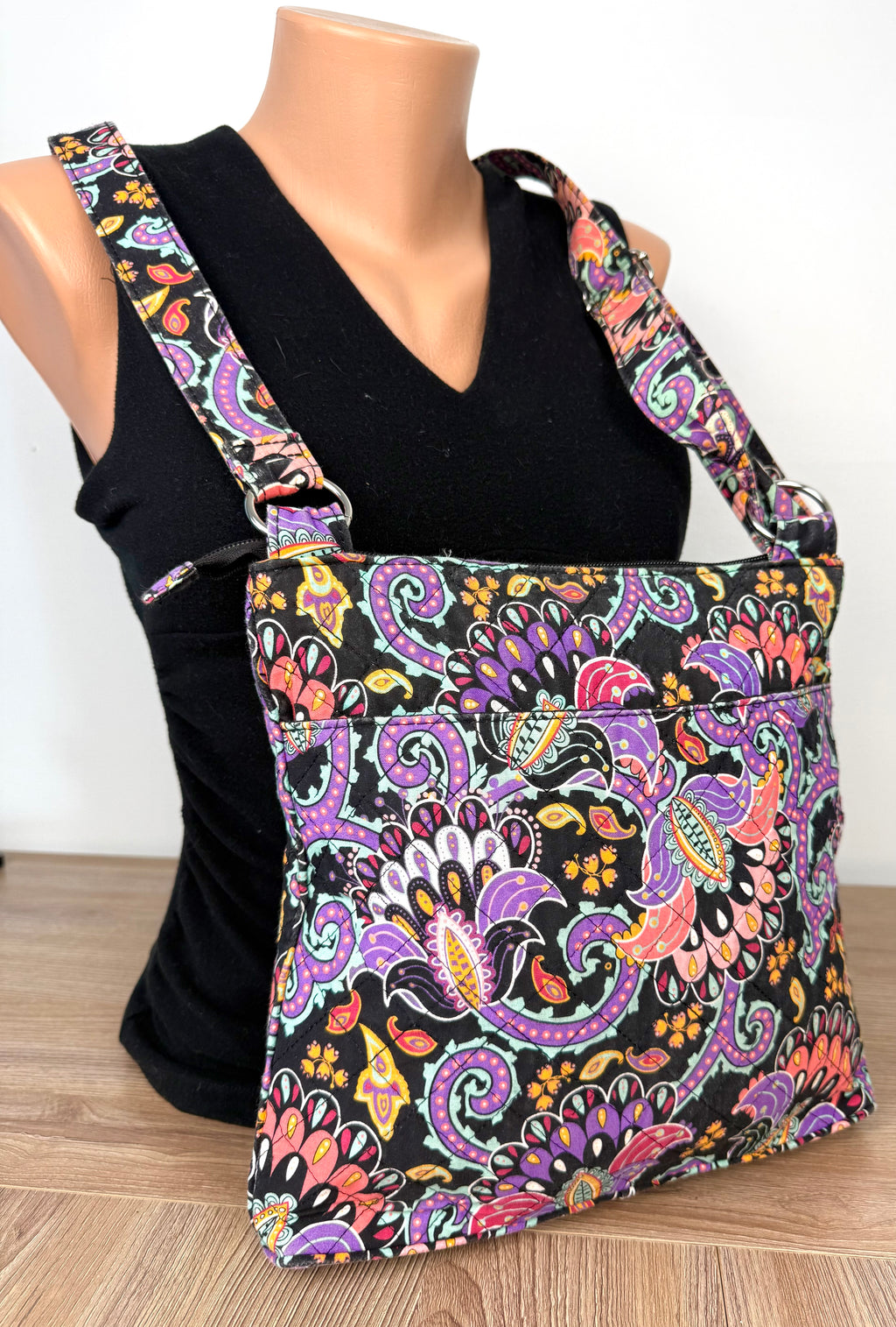 back of Waverly Inspirations Quilted Paisley Crossbody Bag at Blue Sparrow Shop Canadian Resale Reimagined on mannequin to show size