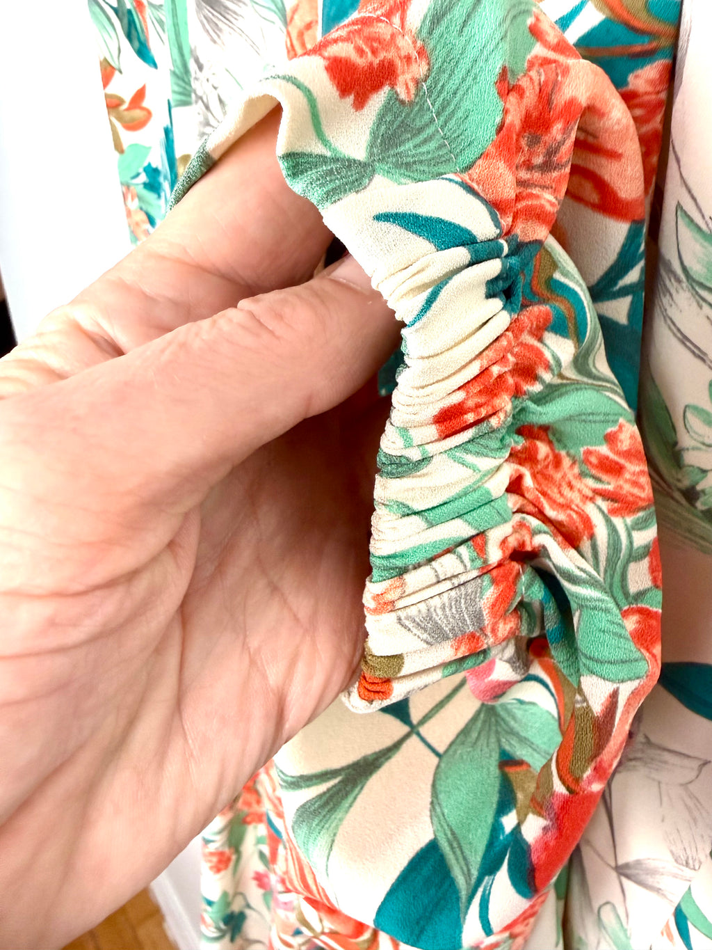 back of cuff on Guess  Floral Jogger Style Dress Pants at Blue Sparrow 