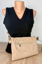 back of pelle italian leather cross body travel bag on mannequin for scale 
