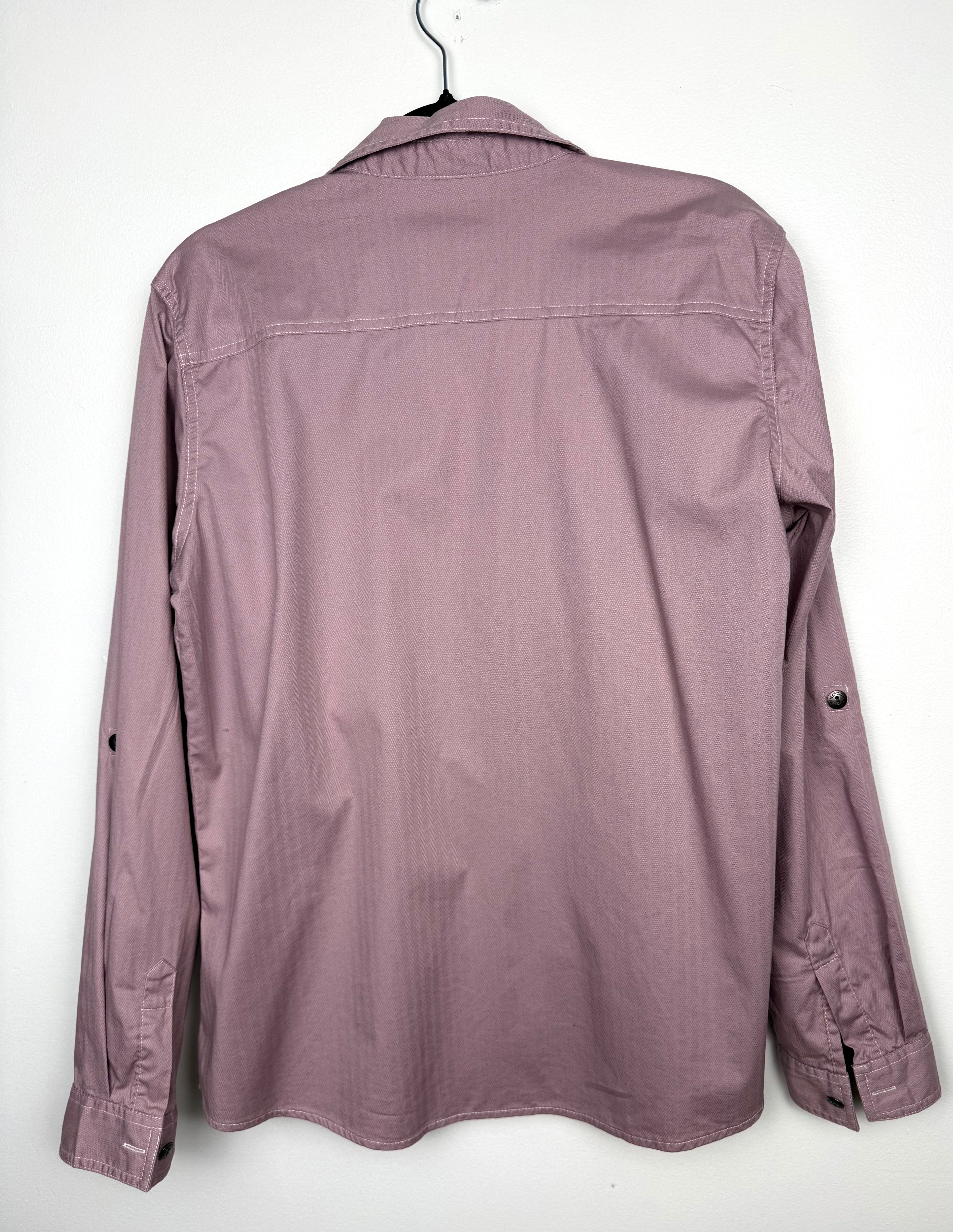 back of women's Dickies brand work shirt in pink  on hanger 