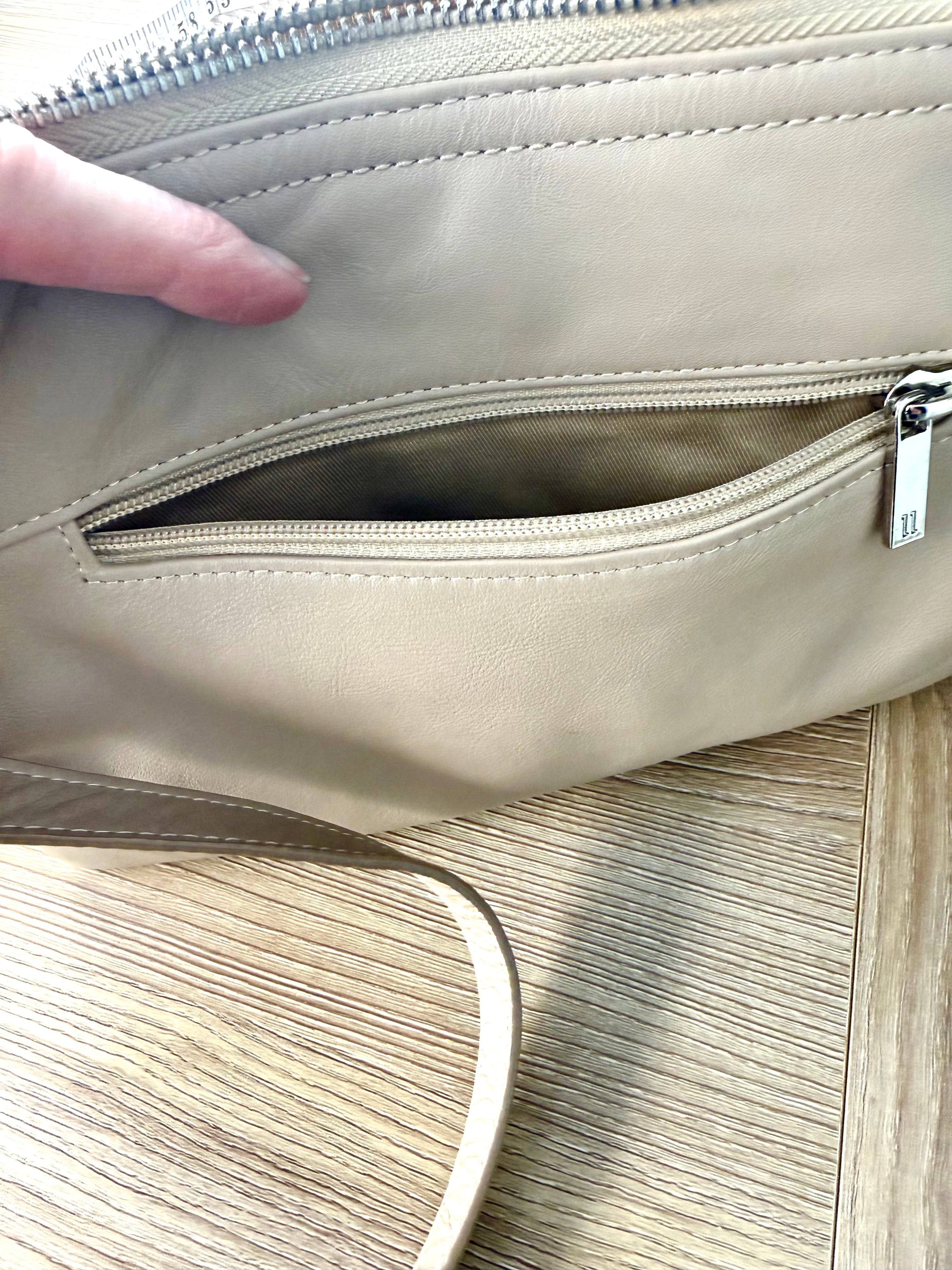 back zipper pocket on pelle-rfid-leather-crossbody-bag