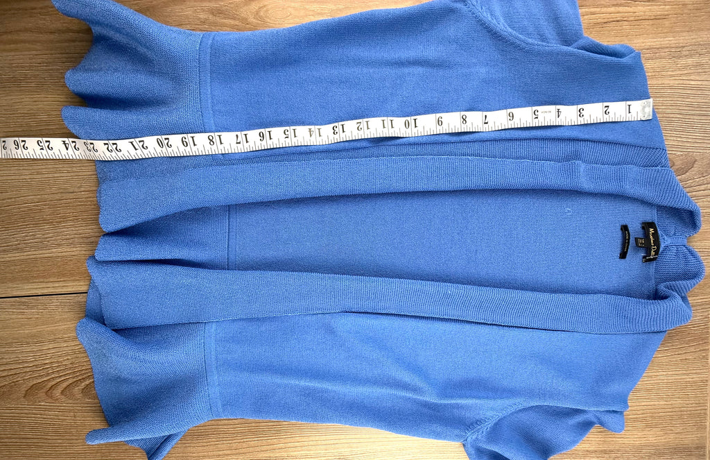 blue lightweight cardigan with peplum waist measuring 23' shoulder to hem