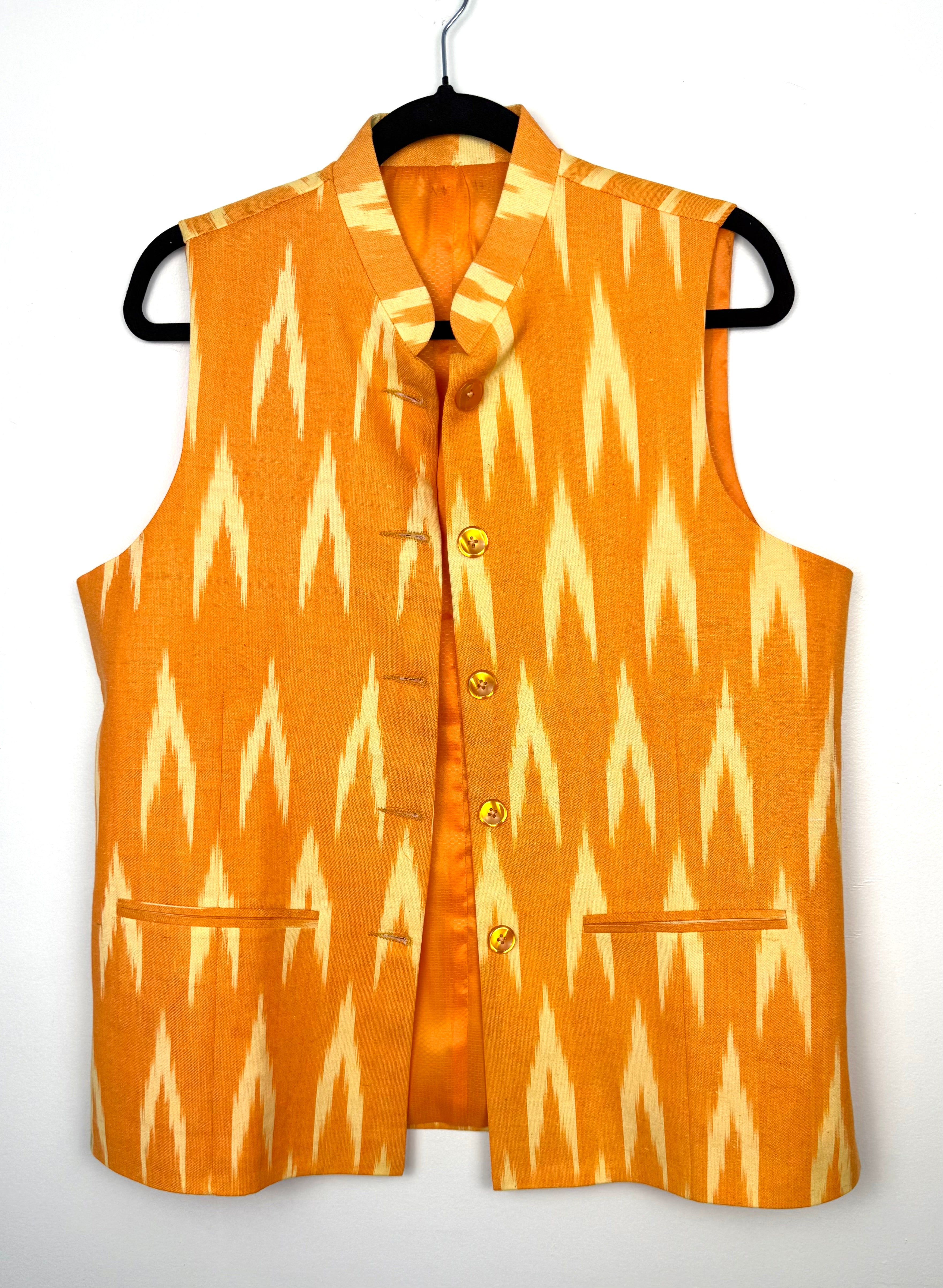boho chic structured vest in ikat print vintage looking vest  on hanger
