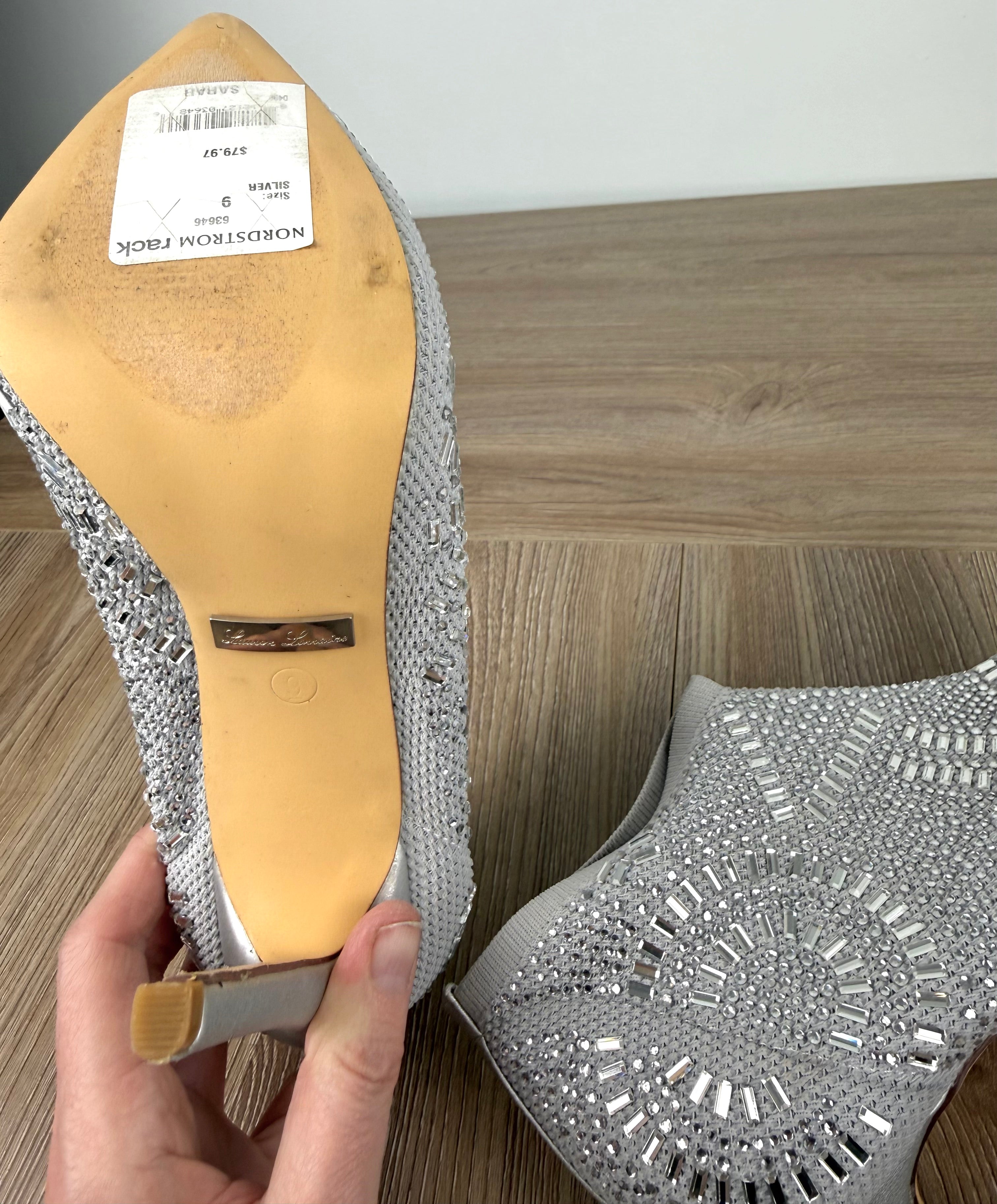 Rhinestone look angle boots | Glitter event boots close up showing price tag