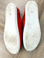 bottoms of Red Sequin Lace-Up Sneakers