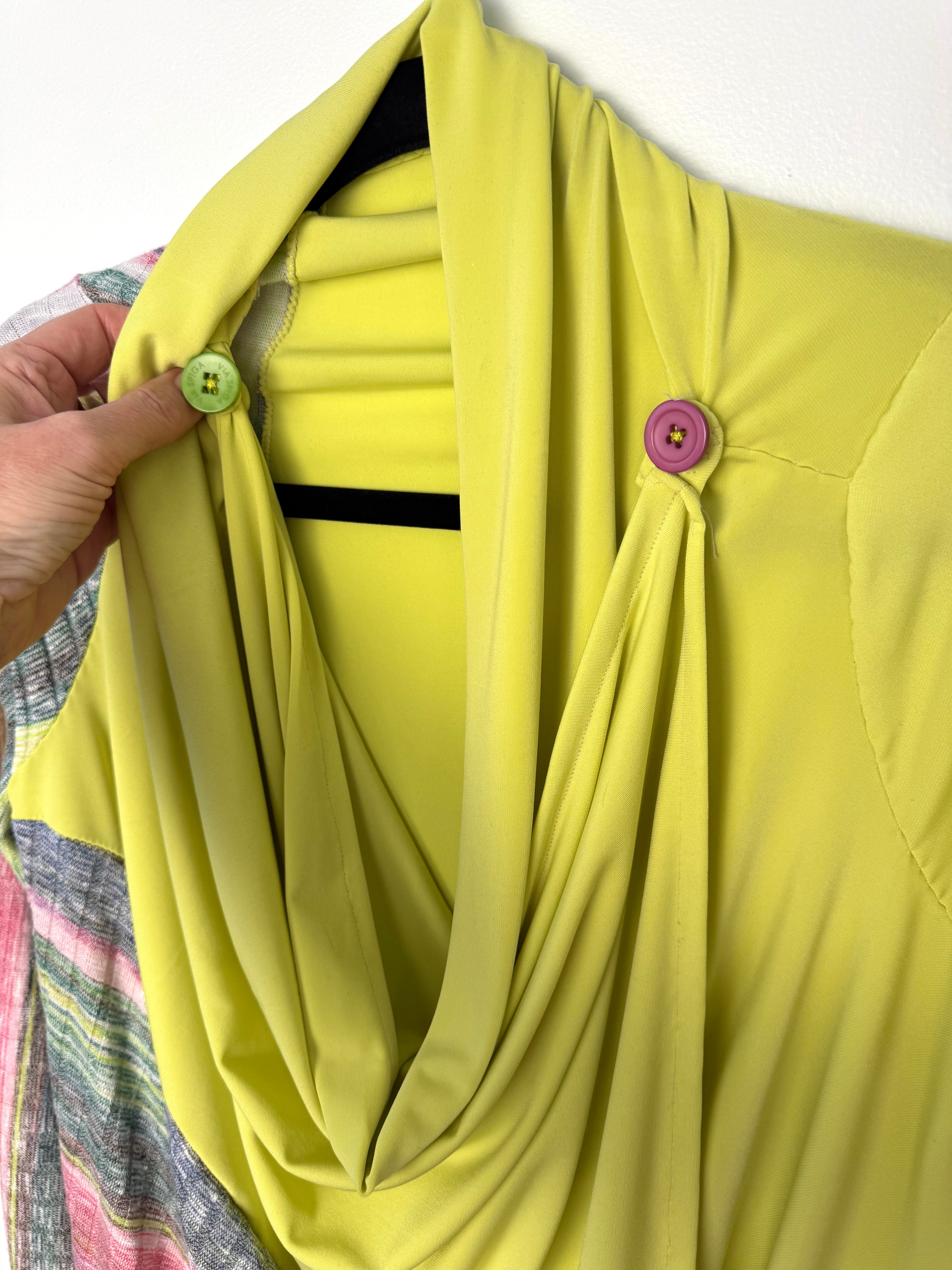 button detail on Handmade lime green draped cardigan with asymmetrical colourblock striped panel in pink and green tones -