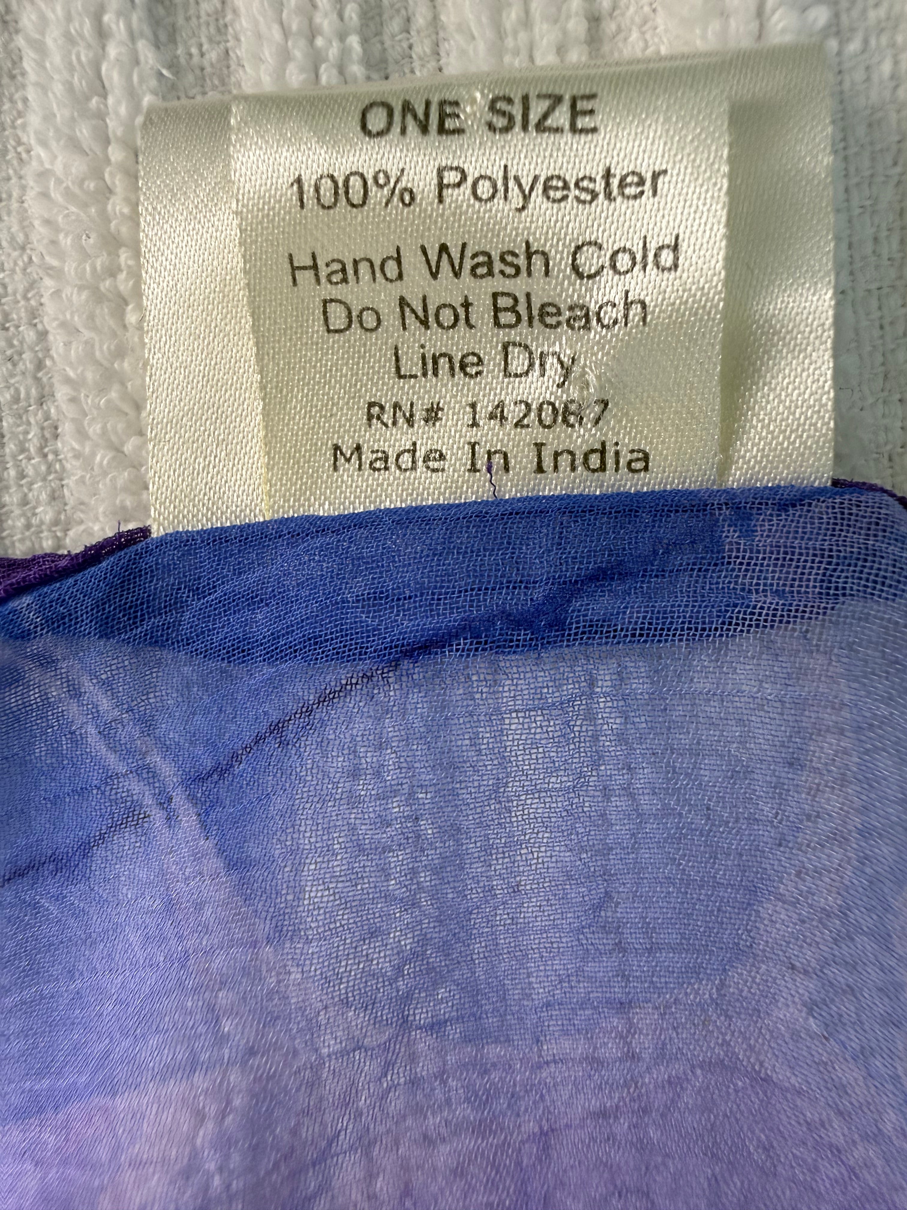 care label on Sheer Batwing Poncho Top | One Size at Blue Sparrow Resale Shop