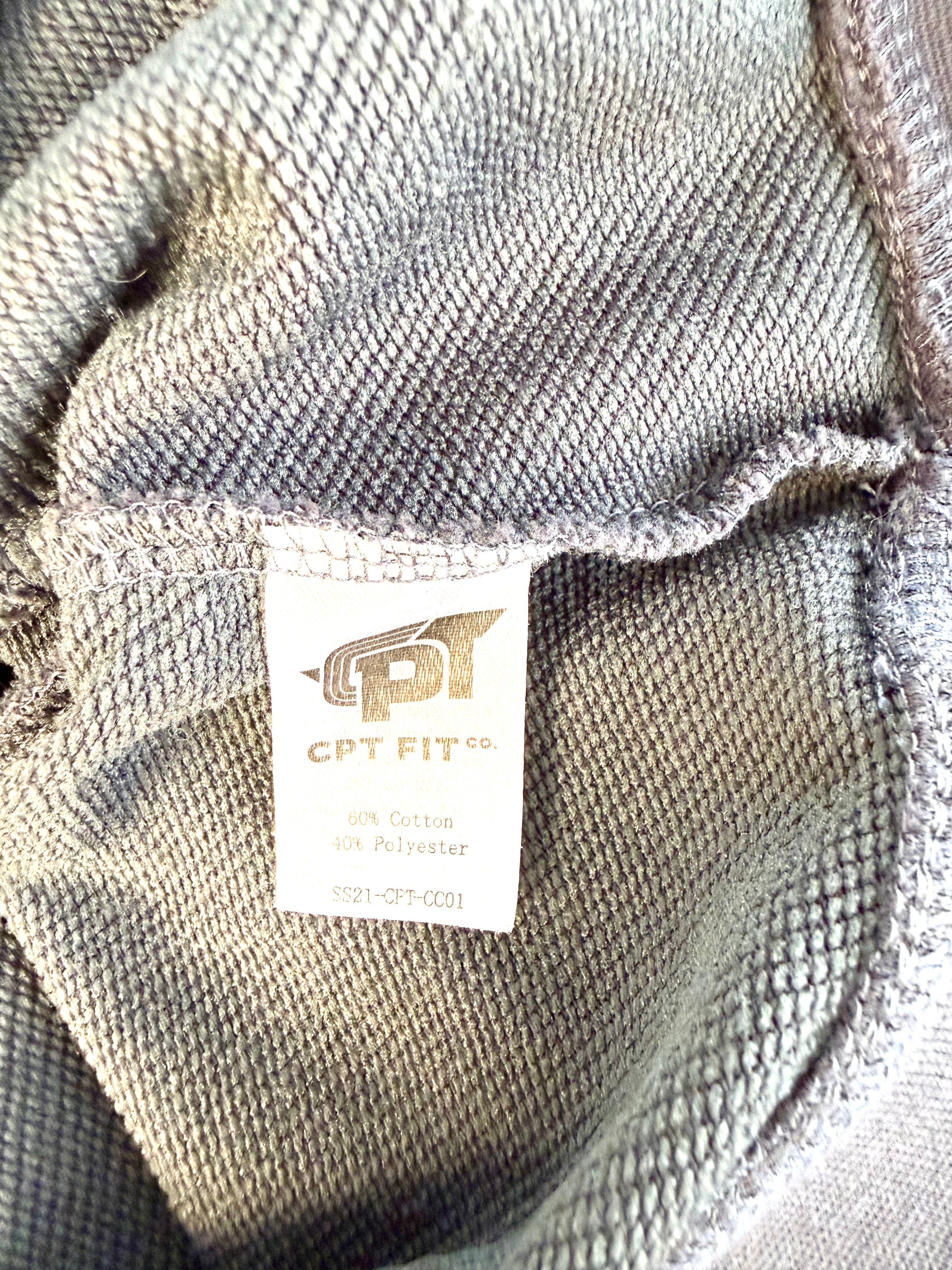 care tag inside cropped sweatshirt with motivational saying on front 