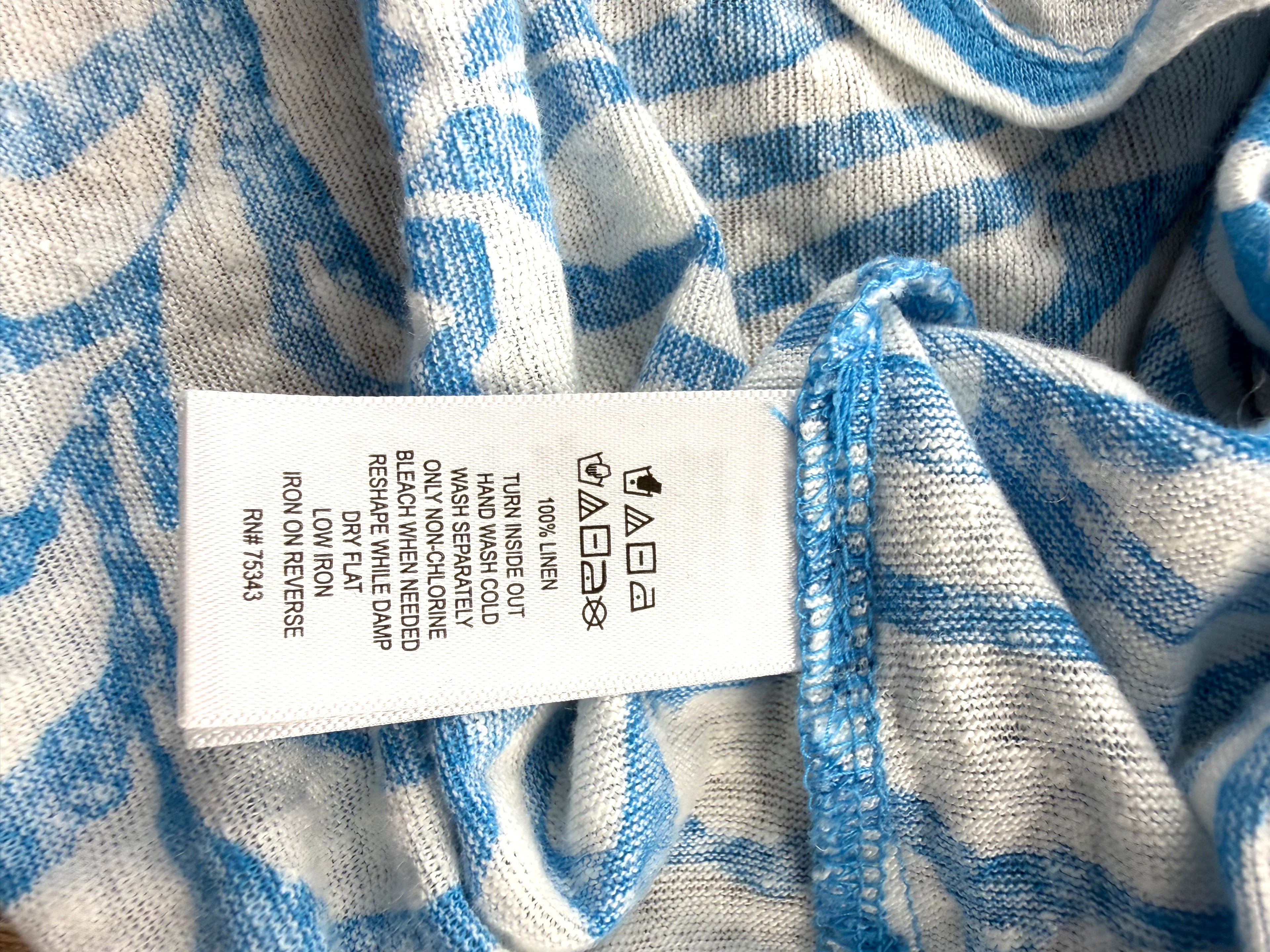 care tag on Tahari 100% linen botanical print top