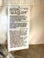 care tags inside NWT Old Navy 100% Cotton Mustard Floral Print Chino Shorts — 5" | Size 12 at Blue Sparrow Shop