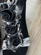 close up of flowers on NWOT Patrizia Harlequin Metallic Heeled Sandals size 40