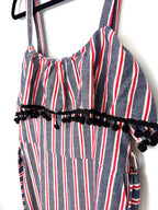 close up of bust detail on Made in Italy Cotton Linen Stripe Wide-Leg Jumpsuit — Denim Blue, Red & White | Pom-Pom Trim | Size M at Blue Sparrow Shop 