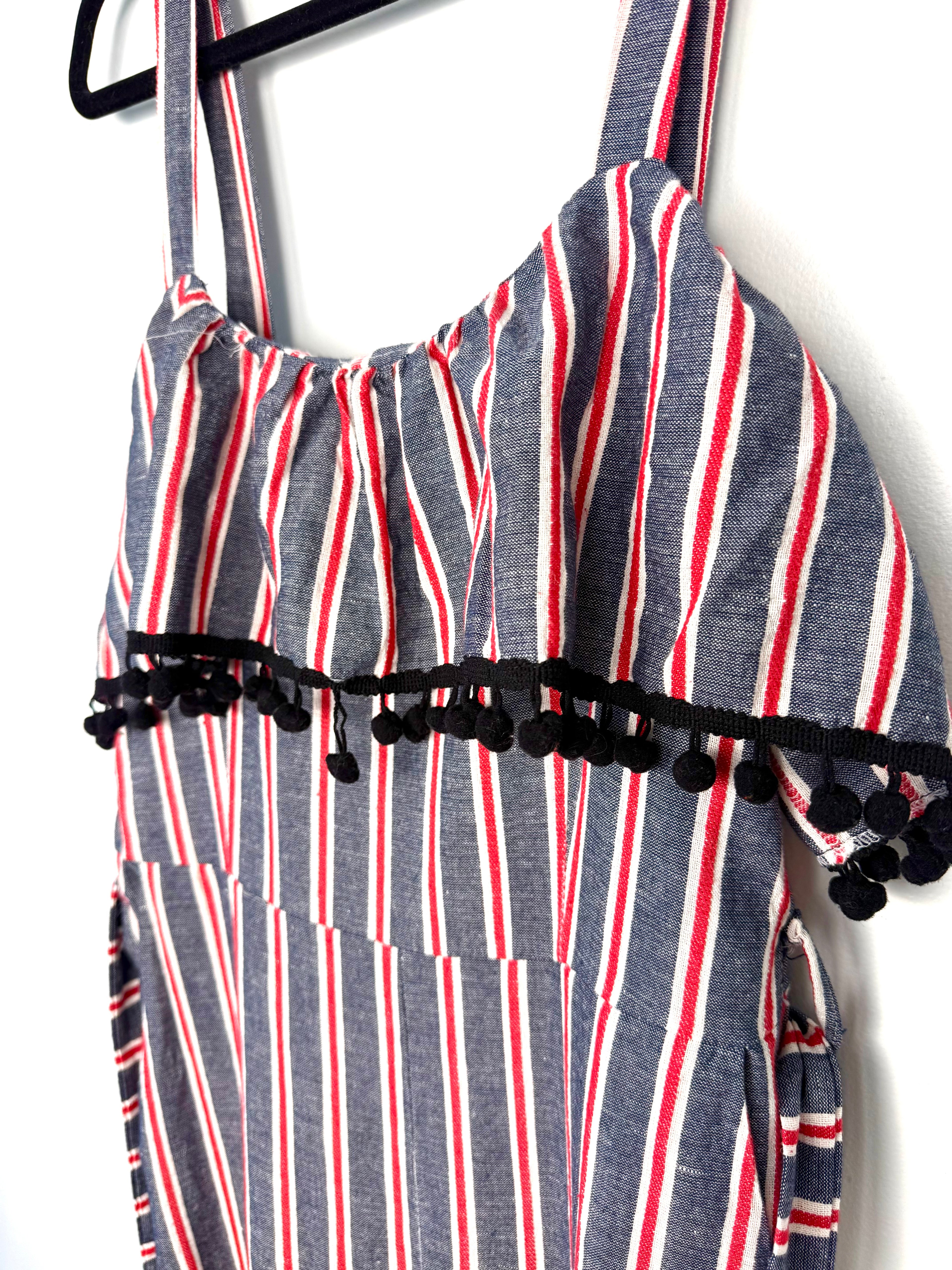 close up of bust detail on Made in Italy Cotton Linen Stripe Wide-Leg Jumpsuit — Denim Blue, Red & White | Pom-Pom Trim | Size M at Blue Sparrow Shop 