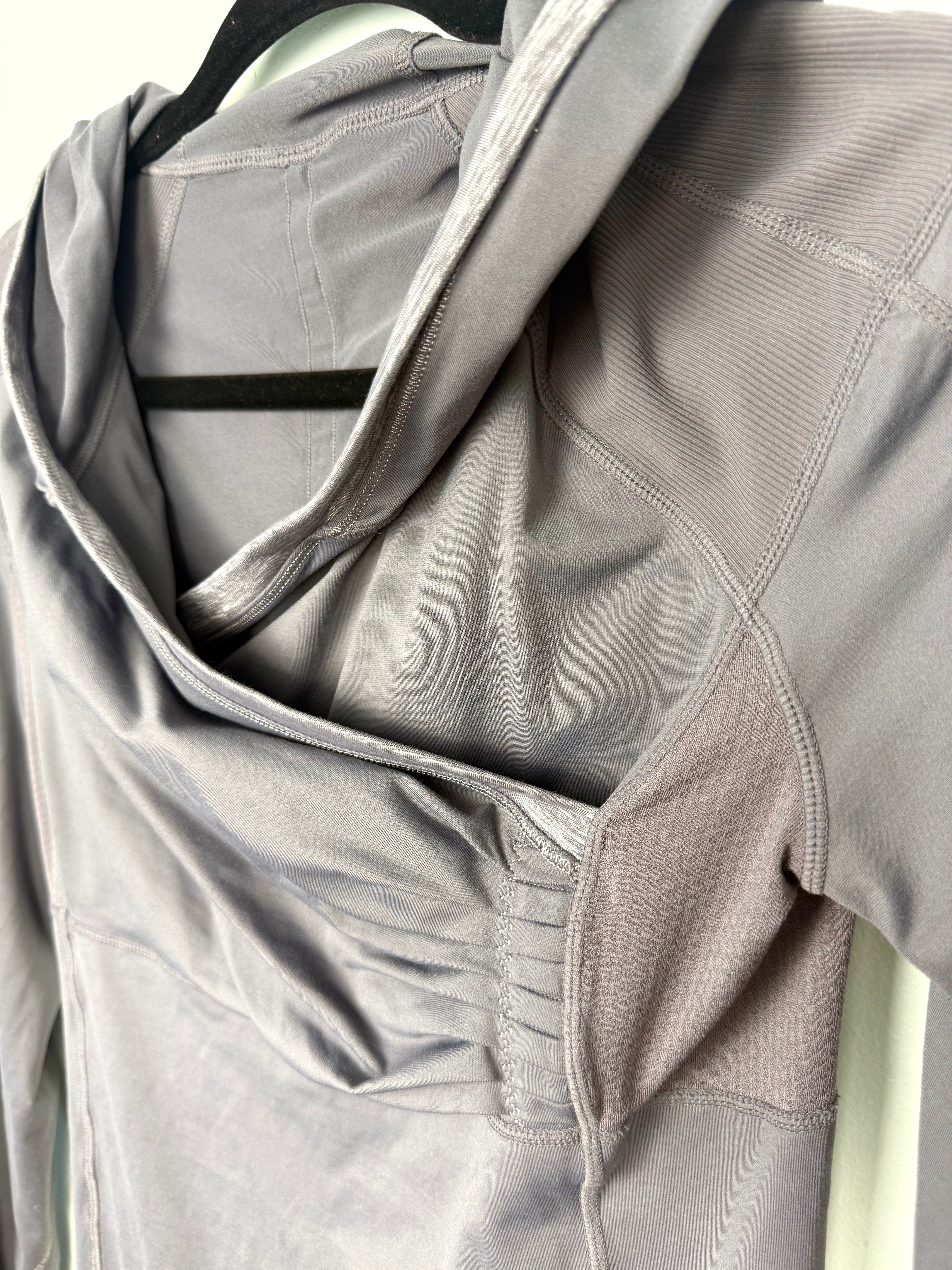 close up of collar on Lululemon grey  zip-up cowl hoodie running jacket back view size 6 thumbhole athletic jacket — Blue Sparrow pre-loved activewear