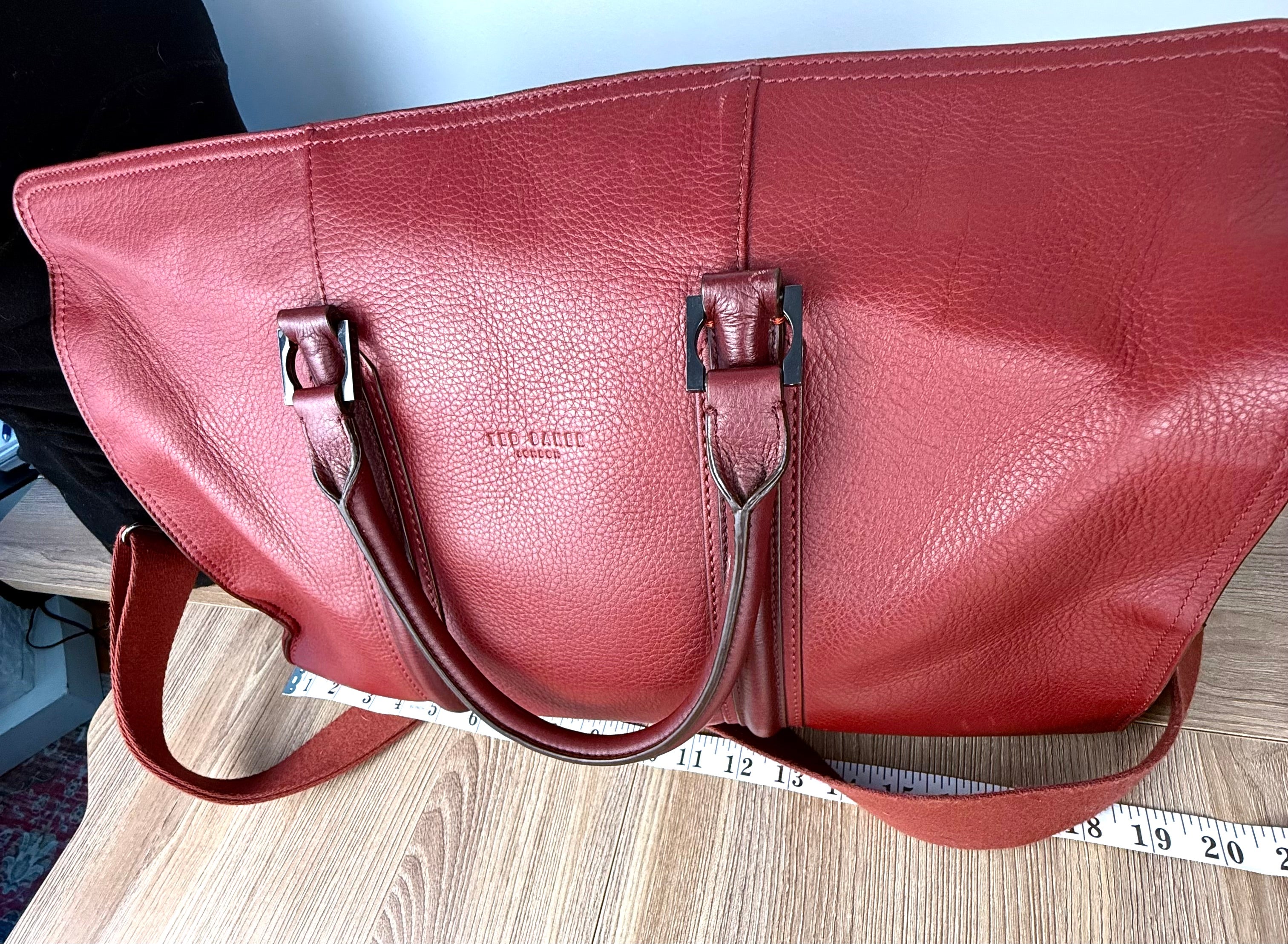 close up of front of Ted Baker London Leather Weekend Travel Duffle Bag