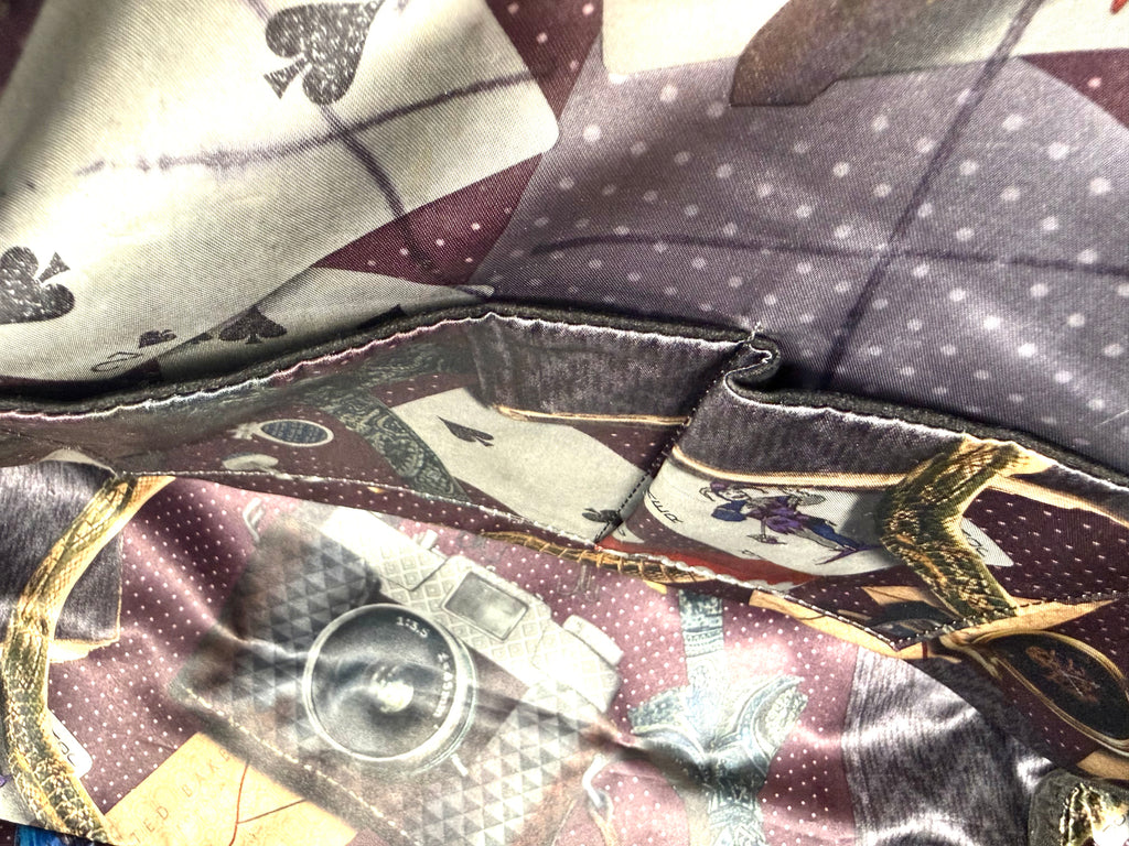 close up of lining inside Ted Baker London Leather Travel Weekend Bag