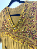 close up of neckline on 100% Cotton Artisan Embroidered Sequin Tunic — Washed Mustard Gold | Boho Festival Top | Est. Small at Blue Sparrow Shop